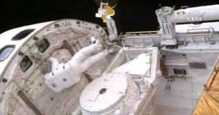 NASA Astronauts Leave Atlantis for Spacewalk to Repair Hubble